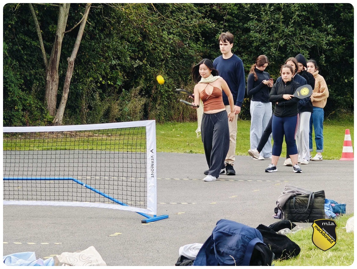 Girls playing pickle ball